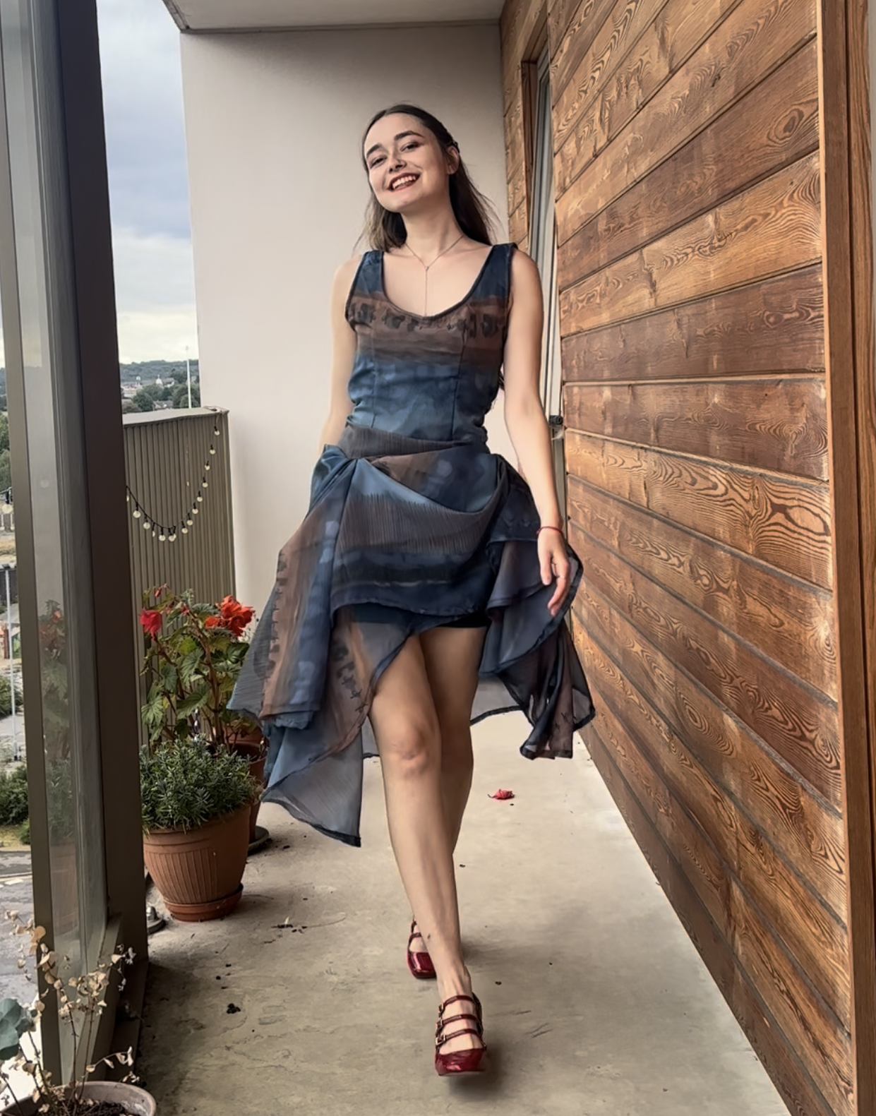 A second dress made from recycled curtains